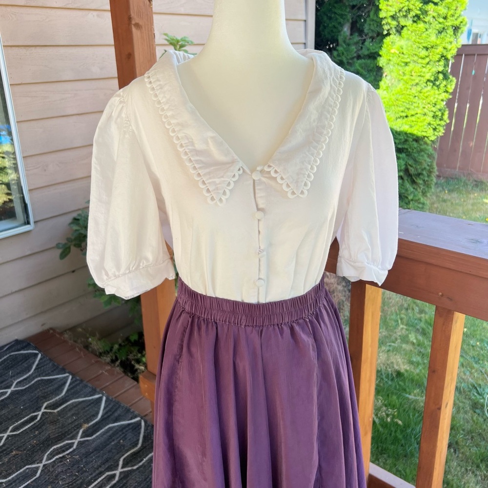 White Blouse with Purple Skirt